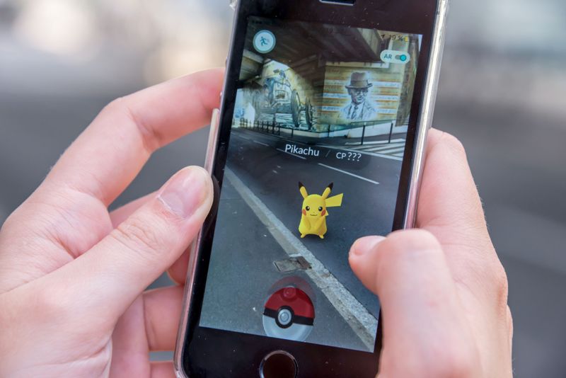 Apple iPhone5s with Pikachu from Pokemon Go application